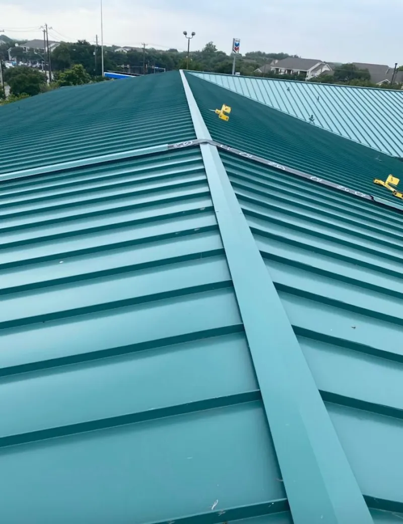 Green commercial metal roof ridge and valley for Metal Roof Repair in Castle Rock